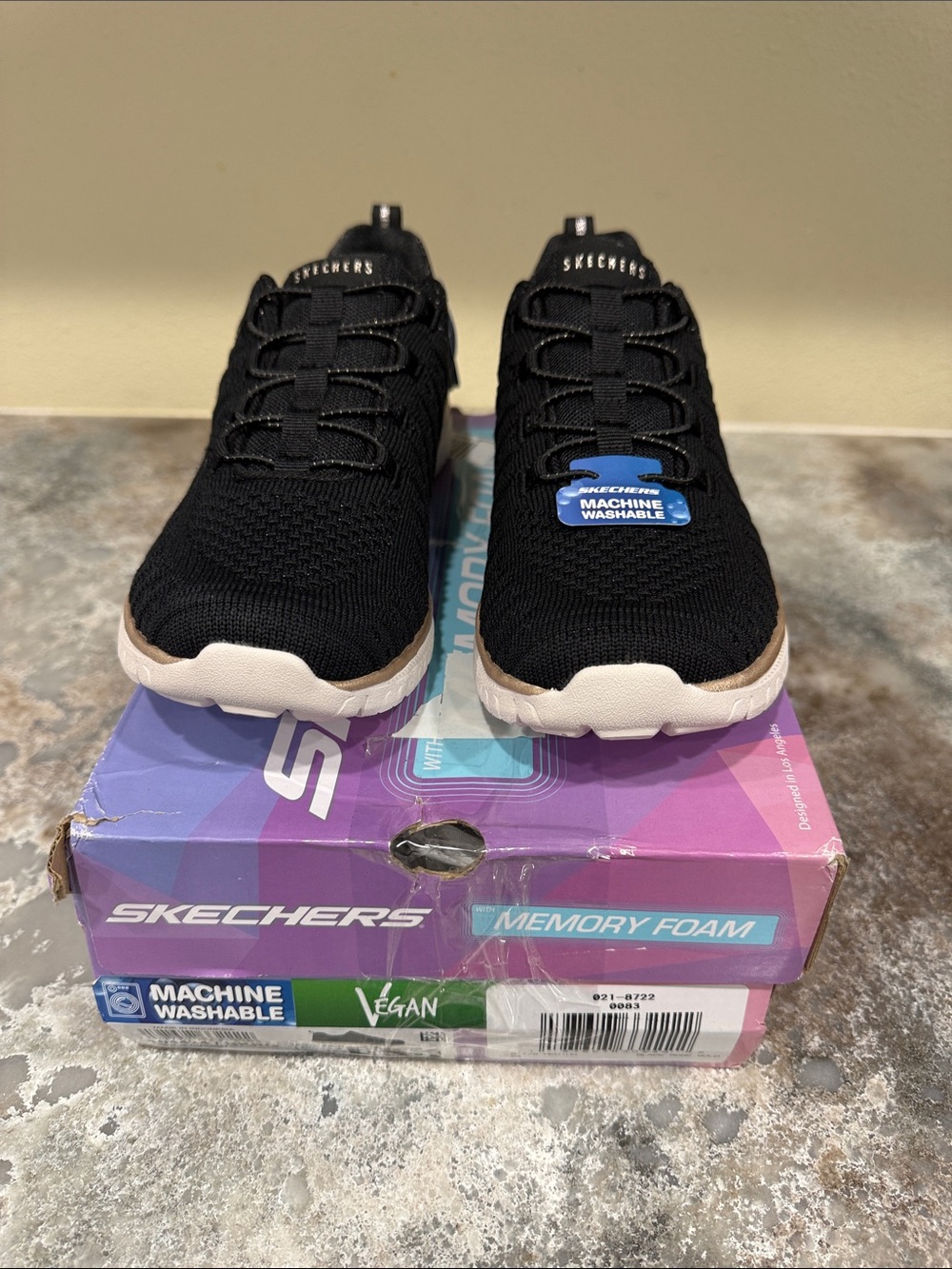 Skechers Women’s Black Knit Athletic Slip-On Sneakers with Cream Sole
